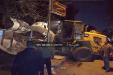 صور| بمساهمة الأهالى.. إزالة مبان مخالفة بمطعم فى المهندسين 