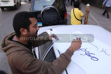 وقفة امام مجلس الدوله للمطالبة باستكمال علاج الناشط معوض عادل