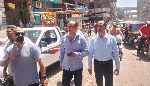 الجيزة تواصل حملاتها لتحرير الشوارع من الإشغالات وأعمال الفرز (صور) 