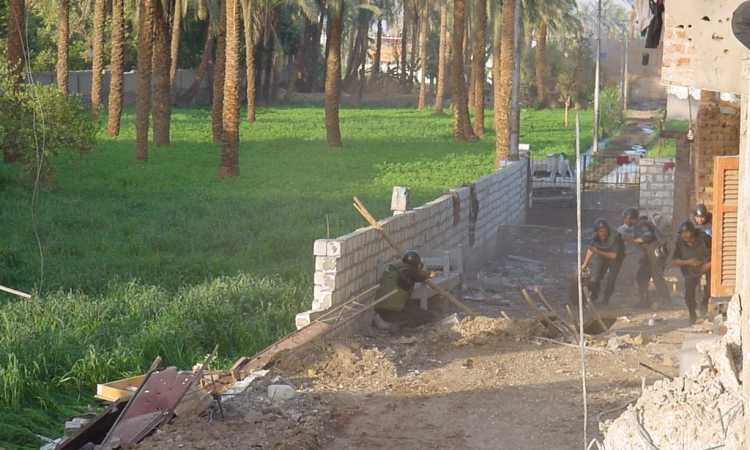 الأمن يداهم النخيلة فى عام 2004 - أرشيفية