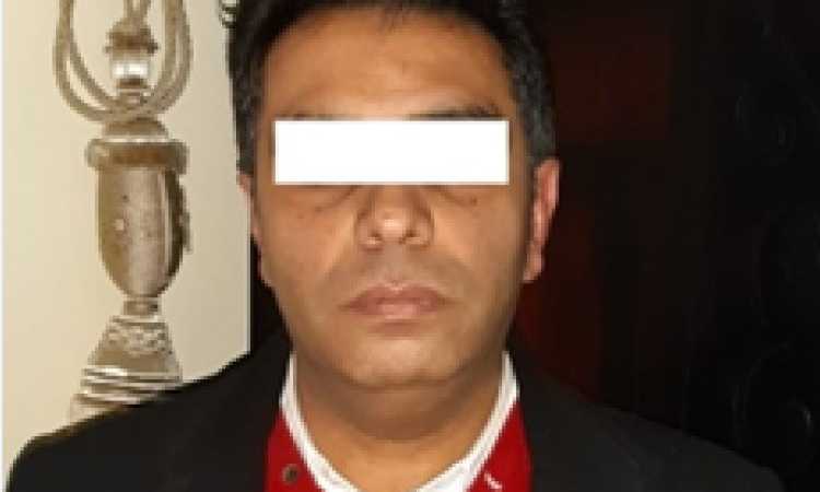 المتهم بعد القبض عليه