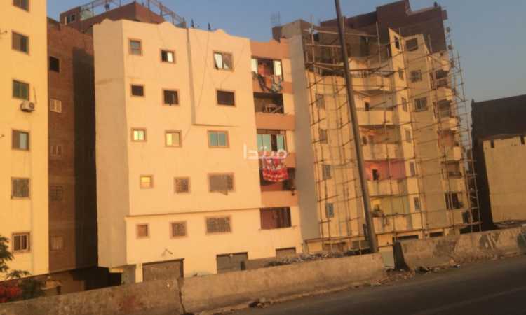 طلاء واجهات العقارات على الطريق الدائرى
