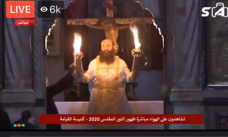 انتهاء مراسم فيض النور من قبر المسيح