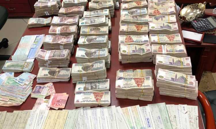 القبض على شبكة منظمة من ثمانية تجار عملة بأربعة محافظات