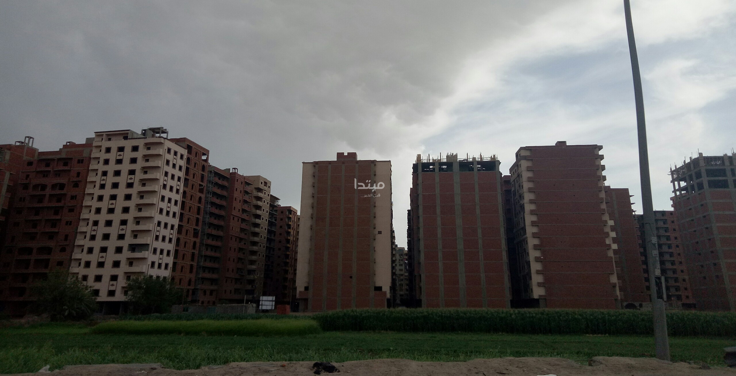 طلاء واجهات العقارات على الطريق الدائرى
