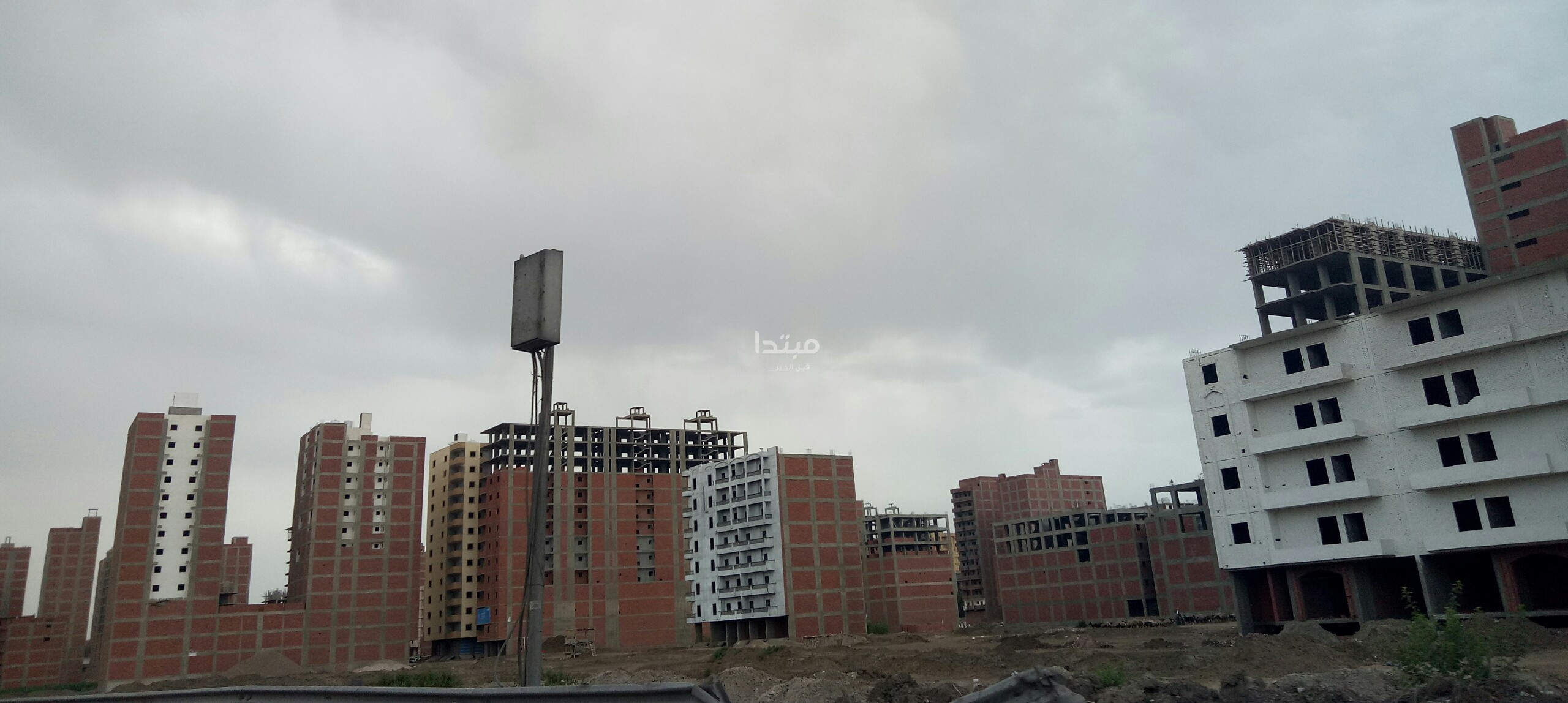 طلاء واجهات العقارات على الطريق الدائرى