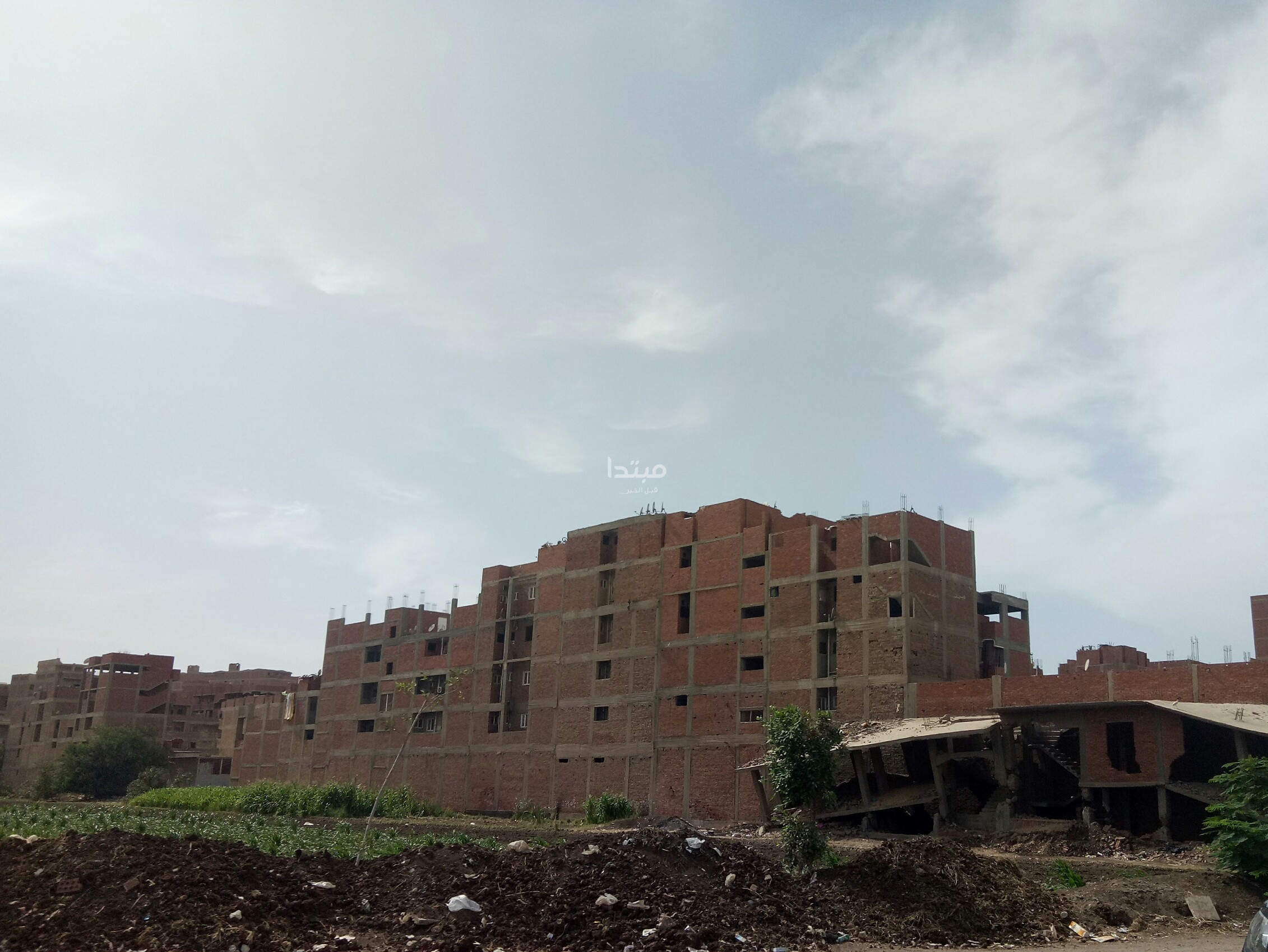 طلاء واجهات العقارات على الطريق الدائرى
