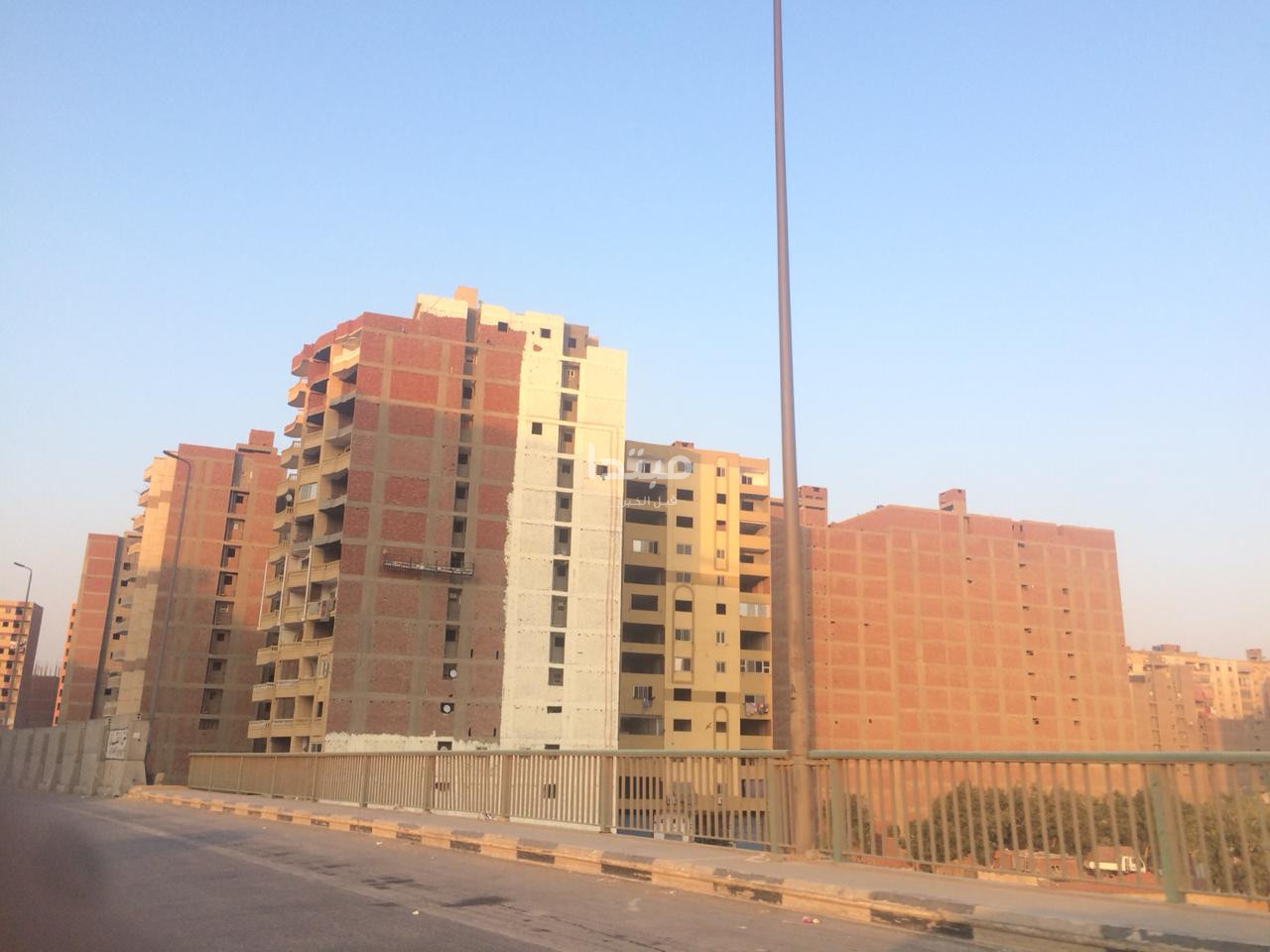 طلاء واجهات العقارات على الطريق الدائرى