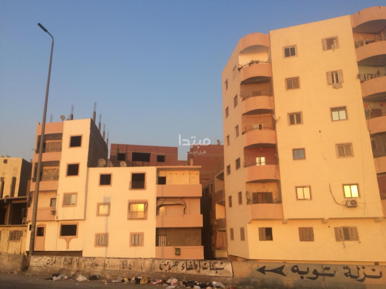طلاء واجهات العقارات على الطريق الدائرى