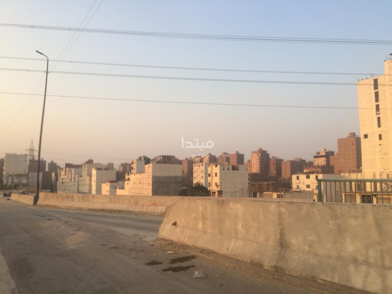 طلاء واجهات العقارات على الطريق الدائرى