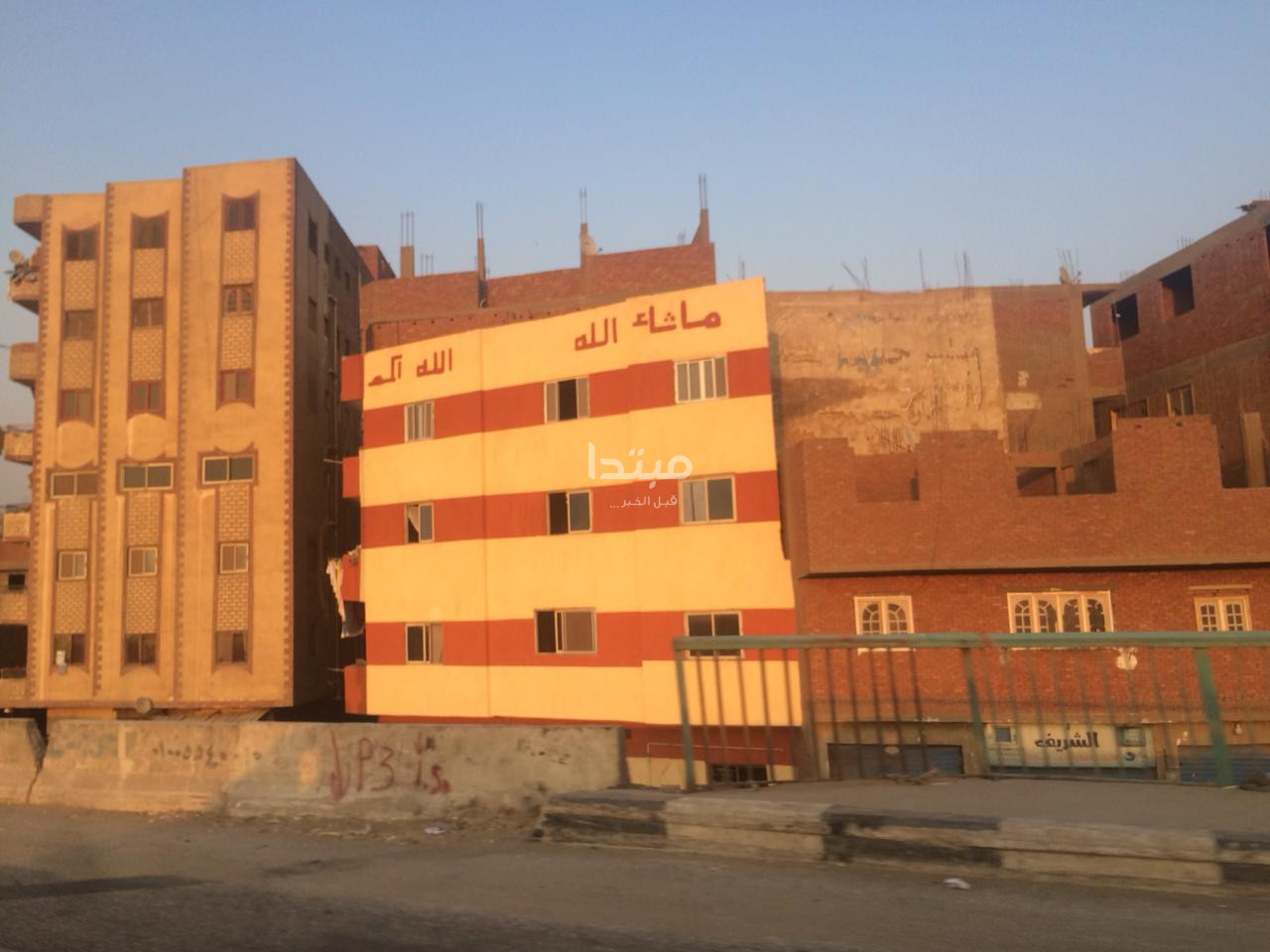 طلاء واجهات العقارات على الطريق الدائرى