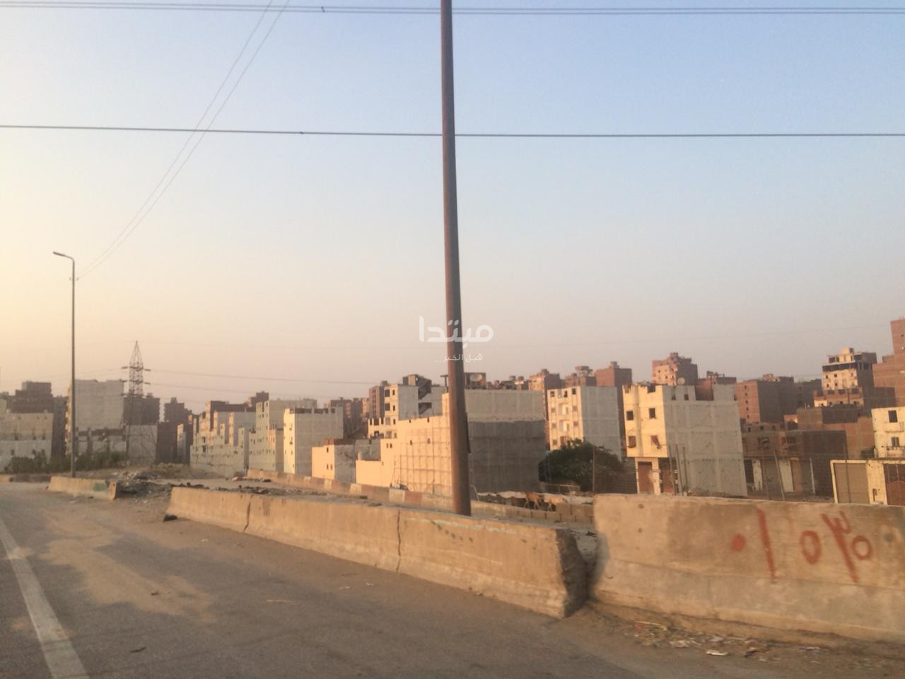 طلاء واجهات العقارات على الطريق الدائرى