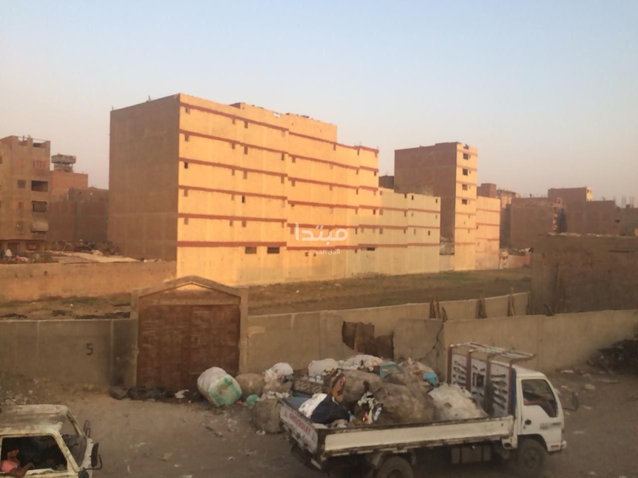طلاء واجهات العقارات على الطريق الدائرى