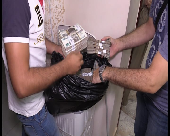 القبض على شبكة منظمة من ثمانية تجار عملة بأربعة محافظات